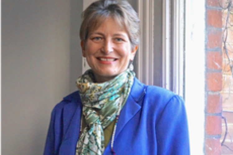 Lori Heise, blue jacket and green scarf